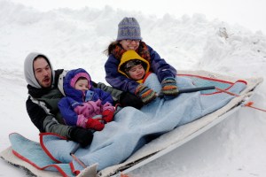 family on sled